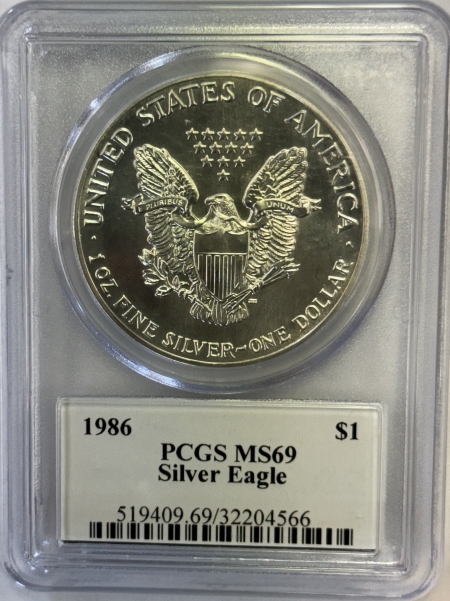 American Silver Eagles 1986 $1 AMERICAN SILVER EAGLE, 1 OZ – PCGS MS-69, JOHN M. MERCANTI SIGNATURE