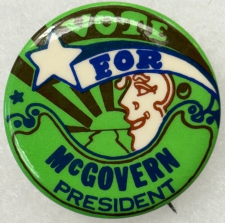 New Store Items 1972 McGOVERN 1 1/2″ CELLO “PETER MAX” BUTTON, ONE OF THE ALL TIME CLASSICS-MINT